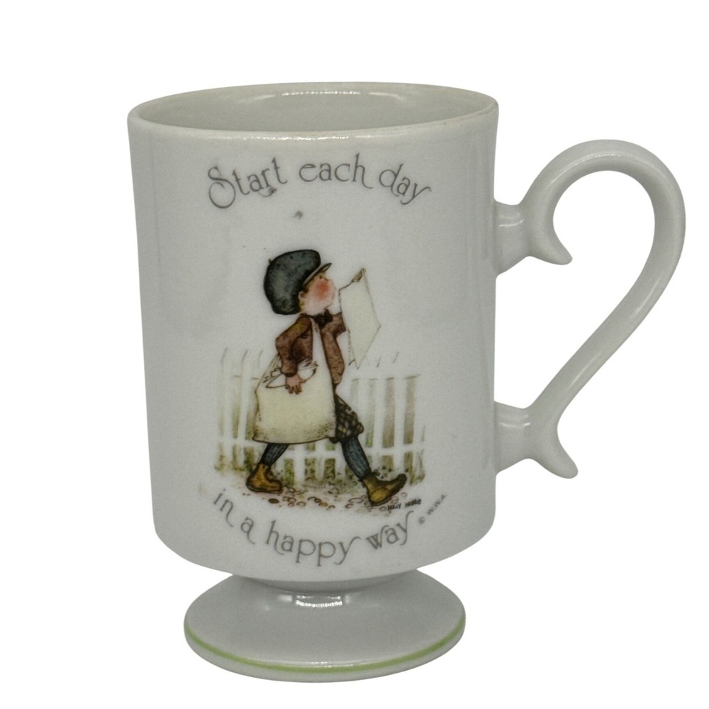 Vintage Holly Hobbie 1974 Porcelain Footed Mug "Start Each Day..." Newspaper Boy
